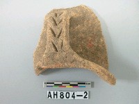 藏品(紅色夾砂帶把陶口緣殘件)的圖片